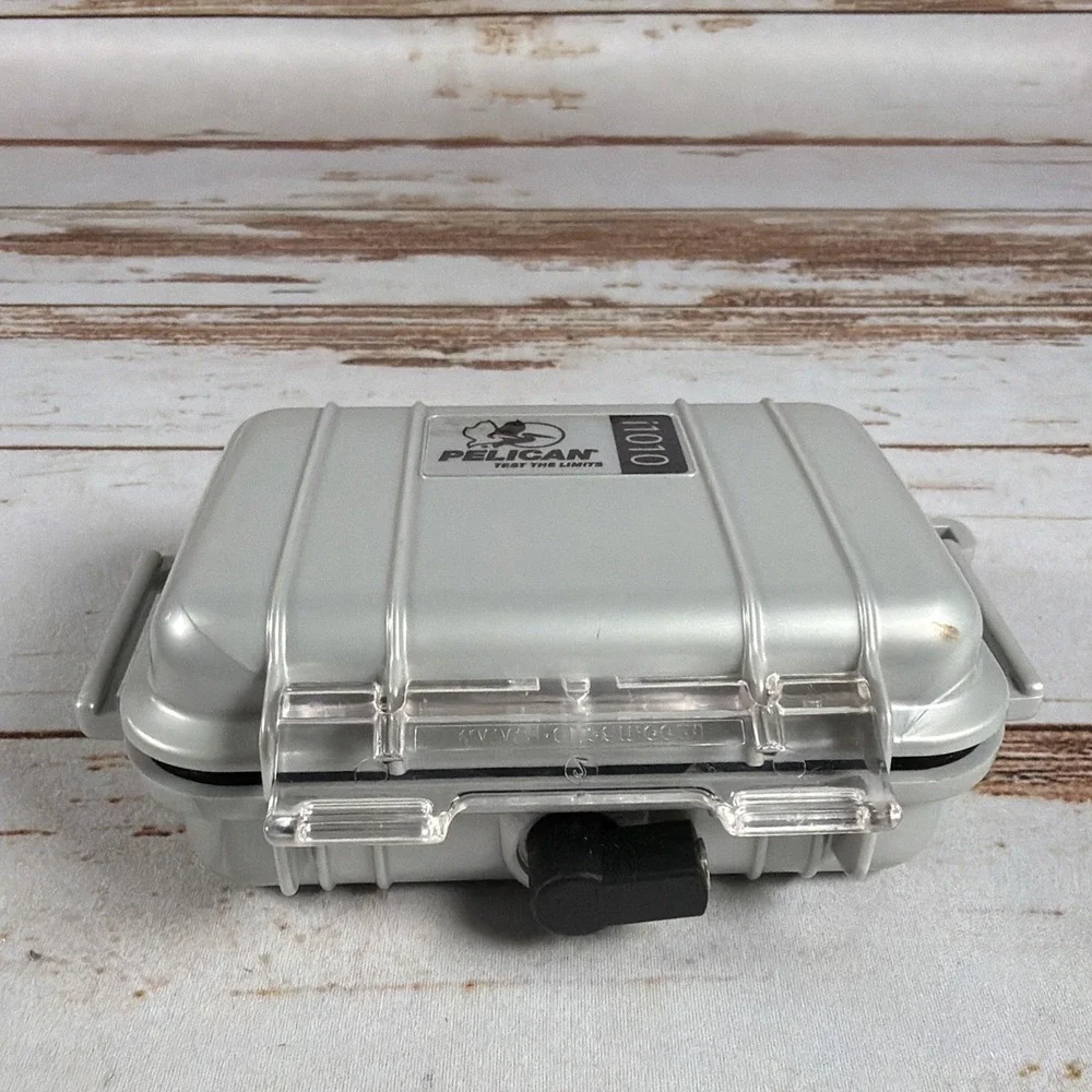 Pelican i1010 Silver Micro Case Waterproof iPod Hard Case w/ Aux Jack Used